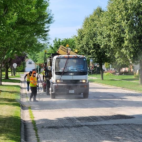 Image of crew completing crack filling work in 2023.